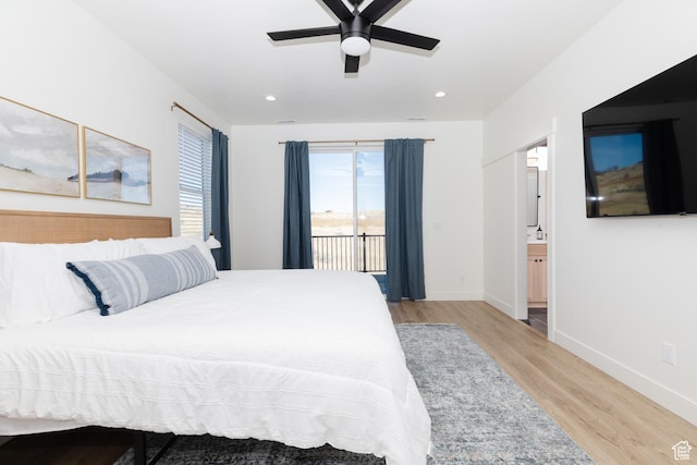 470 Lotus Dr Unit 149, Fish Haven, ID 83287 - bedroom featuring access to outside, wood finished floors, baseboards, recessed lighting, and ensuite bathroom