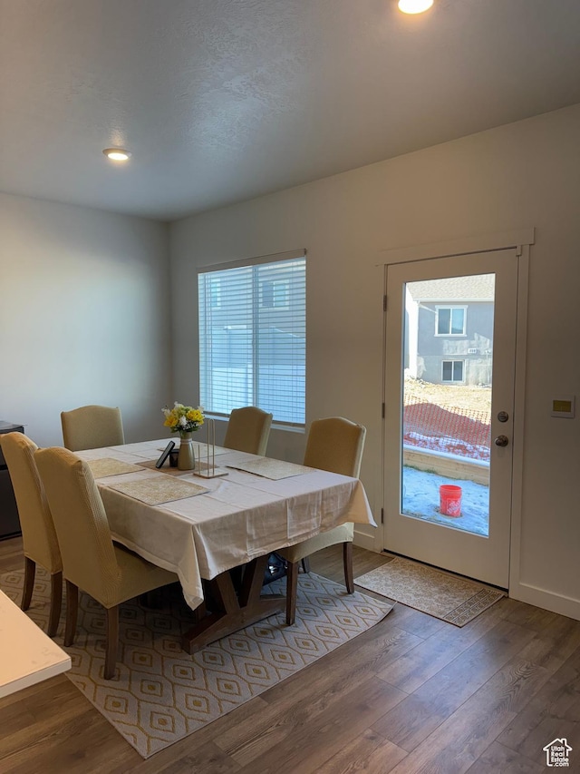dining area featuring hardwood / wood-style flooring