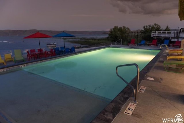 55 W Buttercup Ln Unit 33, Garden City, UT 84028 - pool at dusk with a patio