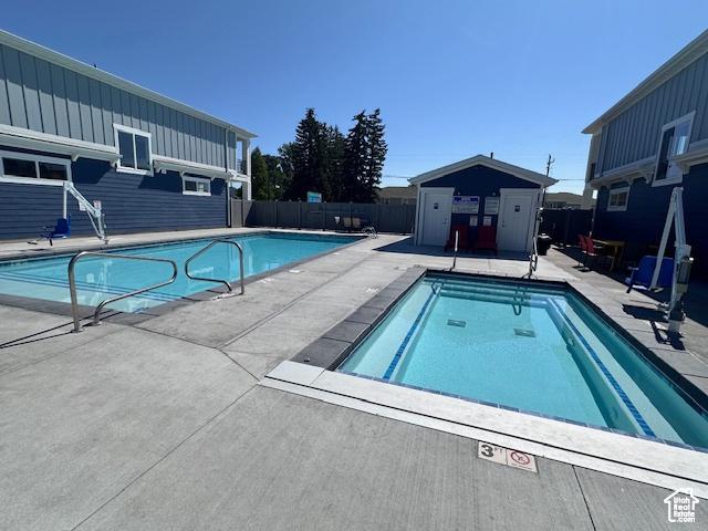 55 W Buttercup Ln Unit 33, Garden City, UT 84028 - view of pool with a patio