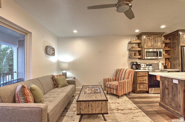 55 W Buttercup Ln Unit 33, Garden City, UT 84028 - living room with ceiling fan and dark wood-type flooring