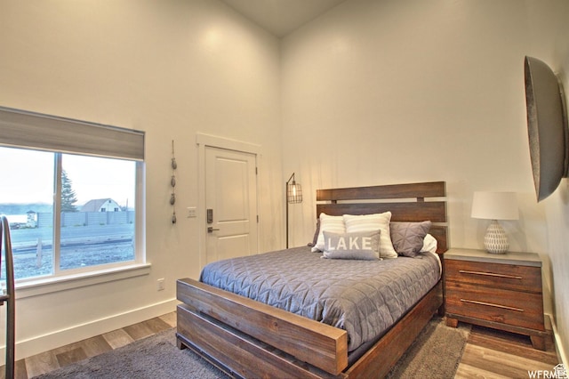 55 W Buttercup Ln Unit 33, Garden City, UT 84028 - bedroom with light wood-type flooring