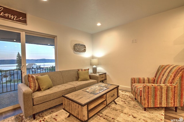 55 W Buttercup Ln Unit 33, Garden City, UT 84028 - living room with light hardwood / wood-style floors and a water view
