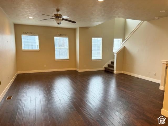 1024 W 700 S, Pleasant Grove, UT 84062 - additional living space featuring ceiling fan, dark hardwood / wood-style flooring, and a textured ceiling