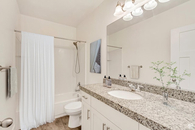 full bathroom featuring hardwood / wood-style flooring, vanity, toilet, and shower / bathtub combination with curtain