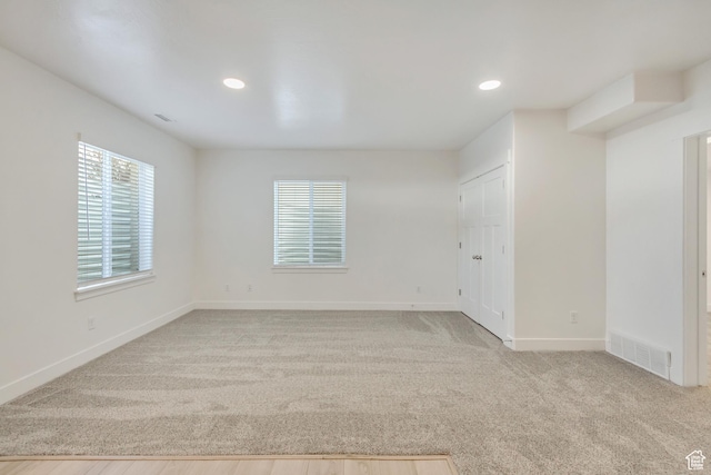 view of carpeted spare room