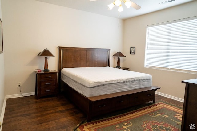 715 Lobo Ln, Washington, UT 84780 - bedroom with ceiling fan and dark wood-type flooring