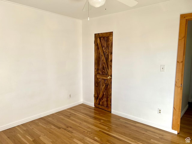 empty room featuring wood-type flooring