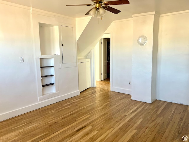 bonus room featuring ceiling fan, lofted ceiling, and light wood-type flooring