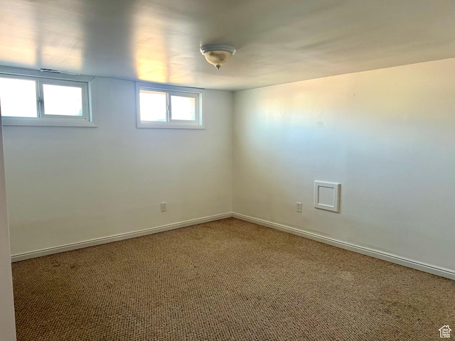 unfurnished room with carpet