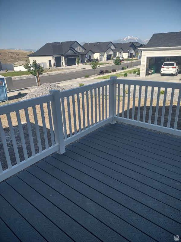 7497 W Sage Slope Way, Herriman, UT 84096 - wooden deck with a residential view
