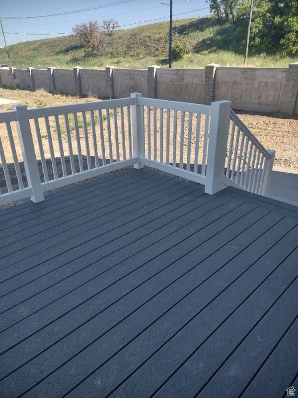 7497 W Sage Slope Way, Herriman, UT 84096 - wooden deck with a fenced backyard