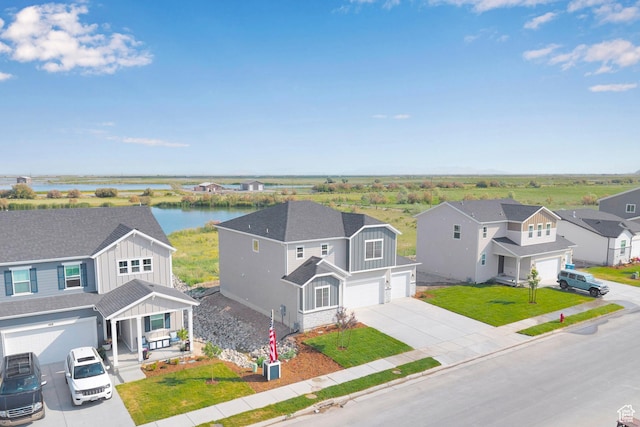 458 W Lefty Ln Unit 1129, Stansbury Park, UT 84074 - aerial view of residential area with a large body of water