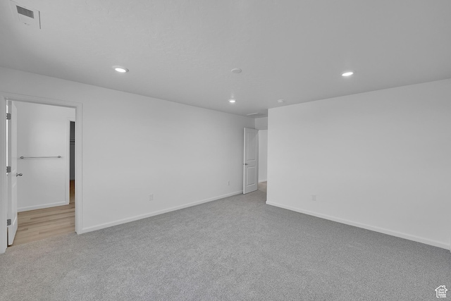 458 W Lefty Ln Unit 1129, Stansbury Park, UT 84074 - empty room featuring recessed lighting, carpet, and baseboards