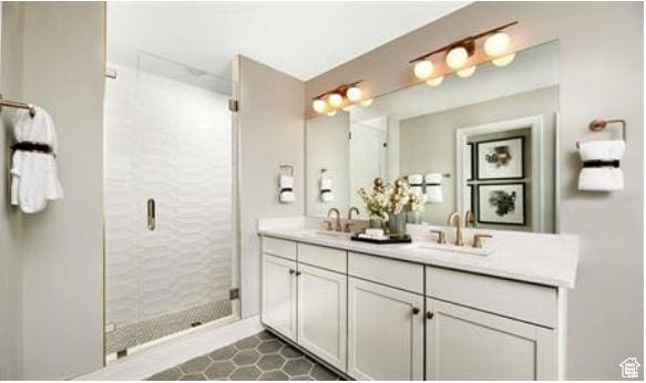 458 W Lefty Ln Unit 1129, Stansbury Park, UT 84074 - bathroom with tile patterned flooring, vanity, and a shower with door