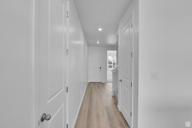 458 W Lefty Ln Unit 1129, Stansbury Park, UT 84074 - hallway featuring recessed lighting, light wood-type flooring, and baseboards