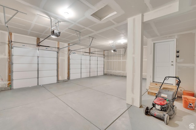 458 W Lefty Ln Unit 1129, Stansbury Park, UT 84074 - garage with a garage door opener