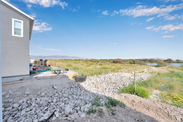458 W Lefty Ln Unit 1129, Stansbury Park, UT 84074 - view of yard featuring a patio area