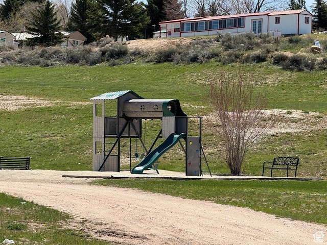 972 E Ridgeway Loop Unit 228, Garden City, UT 84028 - view of property's community with a playground