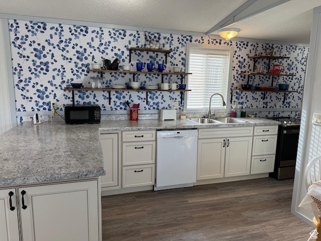 972 E Ridgeway Loop Unit 228, Garden City, UT 84028 - kitchen with white dishwasher, open shelves, black microwave, stainless steel range oven, and a textured ceiling