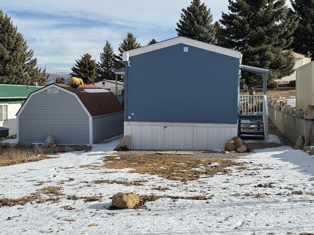 972 E Ridgeway Loop Unit 228, Garden City, UT 84028 - view of snow covered back of property