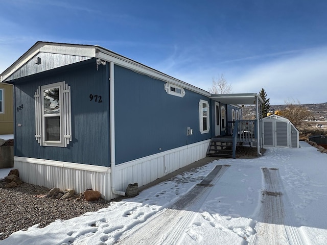 972 E Ridgeway Loop Unit 228, Garden City, UT 84028 - view of snowy exterior