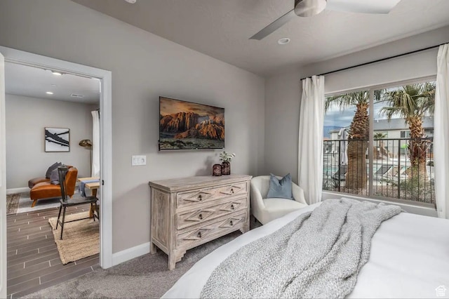 355 N 2020 W, Hurricane, UT 84737 - bedroom featuring access to exterior, ceiling fan, and dark hardwood / wood-style flooring