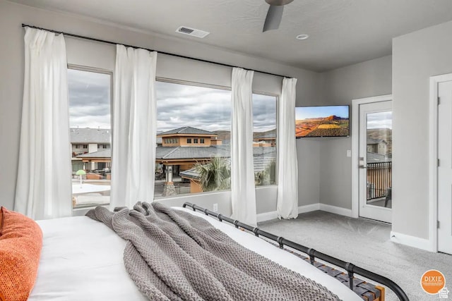 355 N 2020 W, Hurricane, UT 84737 - carpeted bedroom featuring ceiling fan and access to exterior