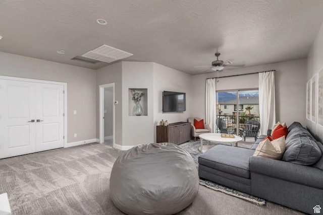 355 N 2020 W, Hurricane, UT 84737 - living room with a textured ceiling, light colored carpet, and ceiling fan