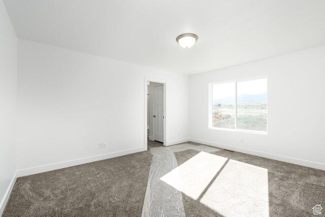1151 W High Plains Dr Unit 605, Grantsville, UT 84029 - empty room with carpet