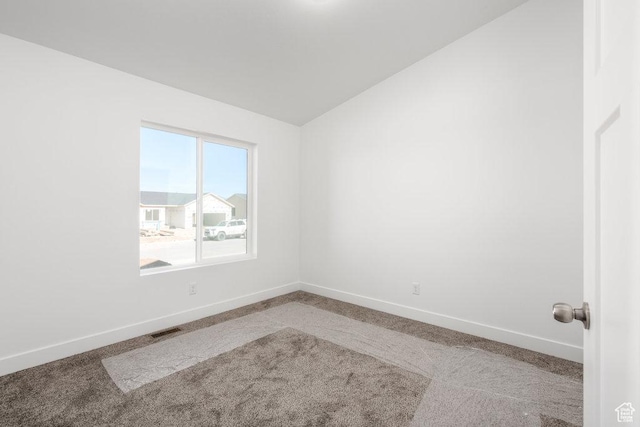 1151 W High Plains Dr Unit 605, Grantsville, UT 84029 - unfurnished room with carpet and lofted ceiling