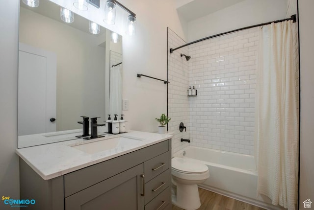 909 W Euclid Ave Unit 4, Salt Lake City, UT 84104 - full bathroom featuring toilet, vanity, hardwood / wood-style flooring, and shower / tub combo with curtain