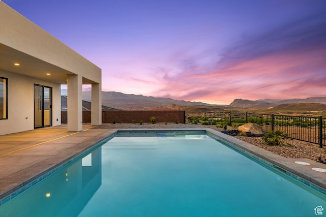 741 S 1800 W, Hurricane, UT 84737 - view of swimming pool with a mountain view, a patio, a fenced in pool, and a fenced backyard