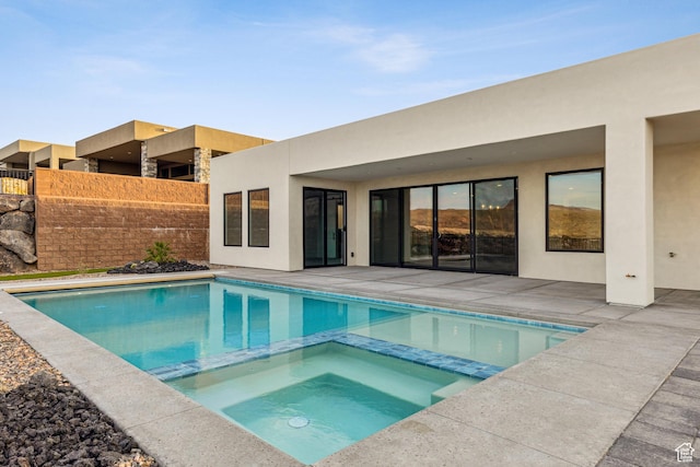 741 S 1800 W, Hurricane, UT 84737 - view of pool with fence, a pool with connected hot tub, and a patio area