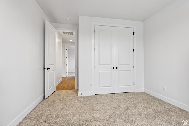 741 S 1800 W, Hurricane, UT 84737 - unfurnished bedroom featuring baseboards, visible vents, a closet, and carpet