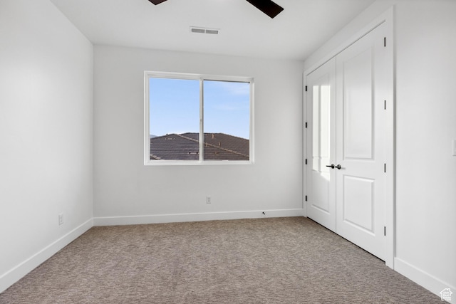 741 S 1800 W, Hurricane, UT 84737 - unfurnished bedroom featuring baseboards, visible vents, a ceiling fan, and carpet floors