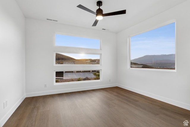 741 S 1800 W, Hurricane, UT 84737 - empty room featuring wood finished floors, ceiling fan, visible vents, and baseboards