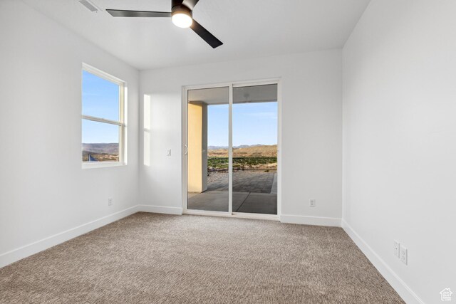 741 S 1800 W, Hurricane, UT 84737 - unfurnished room with visible vents, a ceiling fan, baseboards, and carpet floors