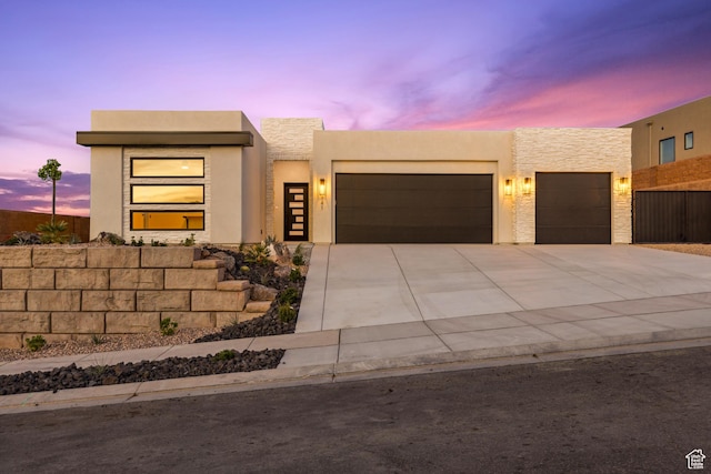 741 S 1800 W, Hurricane, UT 84737 - contemporary house with driveway, a garage, stucco siding, and fence