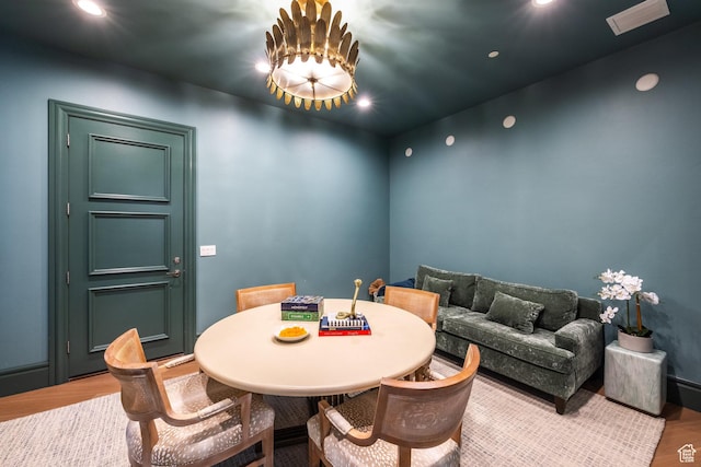 1515 E Bluff Point Dr, Draper, UT 84020 - dining space featuring a notable chandelier and hardwood / wood-style flooring