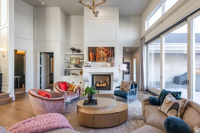 1515 E Bluff Point Dr, Draper, UT 84020 - living room with a towering ceiling and light hardwood / wood-style flooring