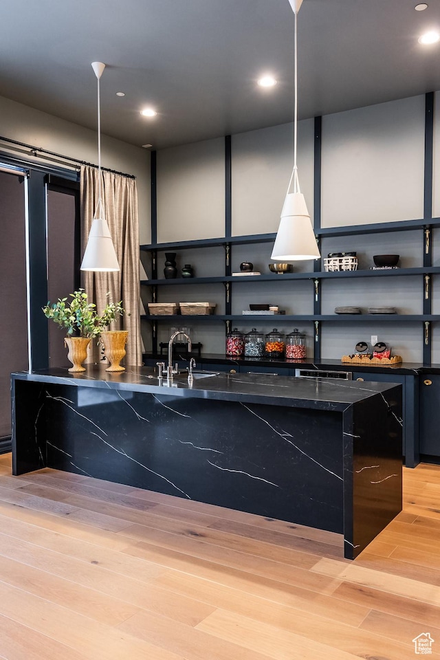 1515 E Bluff Point Dr, Draper, UT 84020 - kitchen featuring open shelves, light wood finished floors, hanging light fixtures, recessed lighting, and dark cabinets