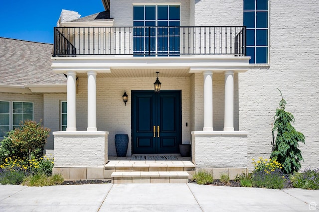 1515 E Bluff Point Dr, Draper, UT 84020 - doorway to property featuring a balcony, a porch, and stone siding