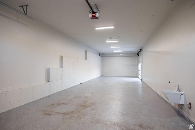 1515 E Bluff Point Dr, Draper, UT 84020 - garage featuring sink and a garage door opener