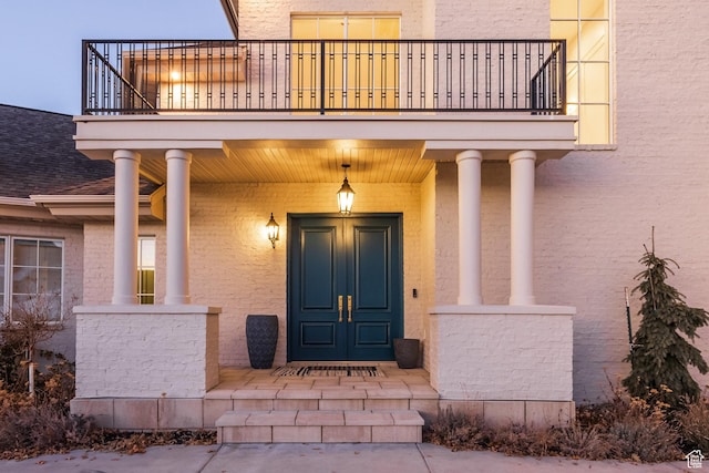 1515 E Bluff Point Dr, Draper, UT 84020 - view of exterior entry featuring covered porch and a balcony