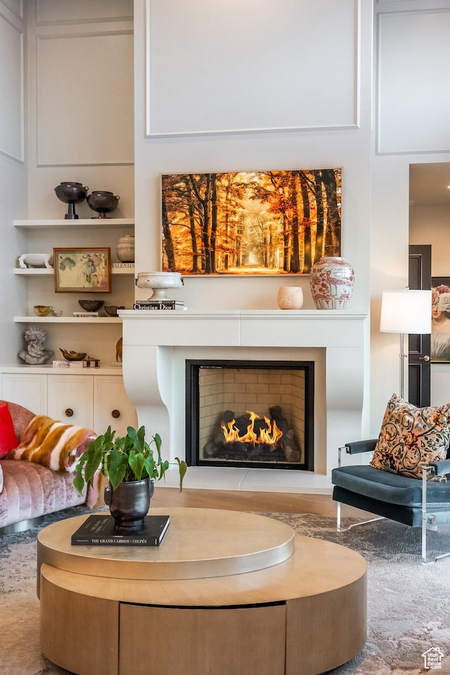 1515 E Bluff Point Dr, Draper, UT 84020 - living room featuring a lit fireplace