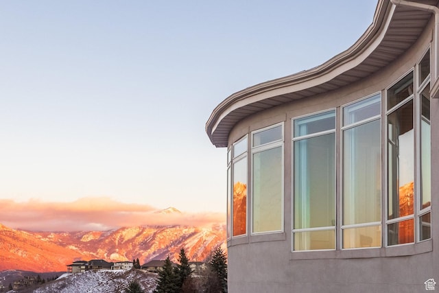 1515 E Bluff Point Dr, Draper, UT 84020 - property exterior at dusk with a mountain view