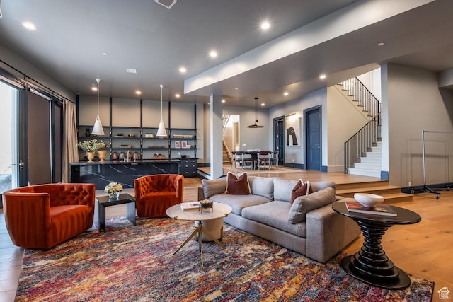 1515 E Bluff Point Dr, Draper, UT 84020 - living room featuring stairway, wood finished floors, and recessed lighting