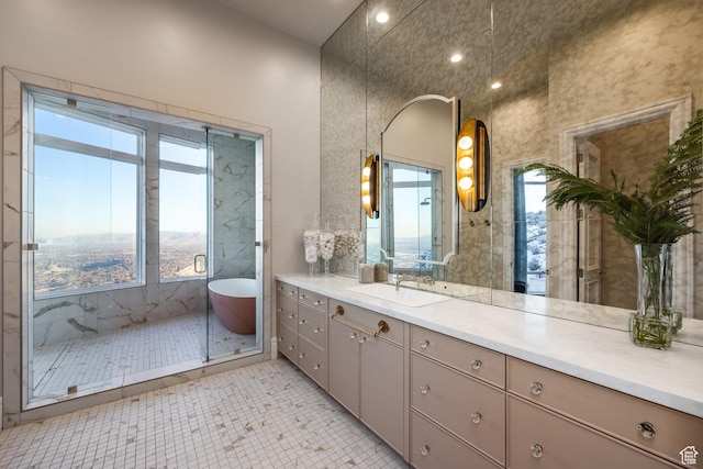 1515 E Bluff Point Dr, Draper, UT 84020 - bathroom with tile patterned flooring, plenty of natural light, shower with separate bathtub, and vanity