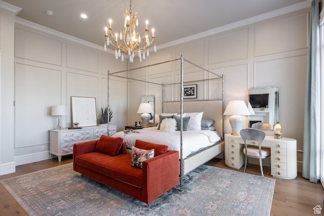 1515 E Bluff Point Dr, Draper, UT 84020 - bedroom featuring ornamental molding, dark wood-type flooring, and a chandelier